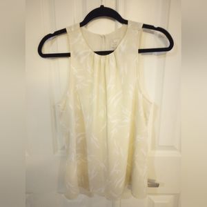 Cream colored sleeveless blouse | Size Small